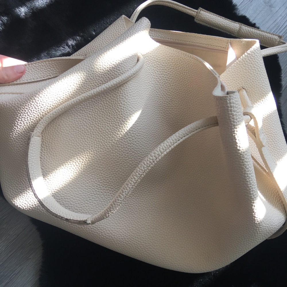 Tan hand bag